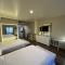 ASPIRE INN & SUITES Orange