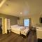 ASPIRE INN & SUITES Orange