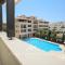 Queens Gardens suite by the sea, pool and mall