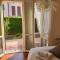 CASETTA MIRAVIGNA cozy flat with garden in Franciacorta & Iseo Lake