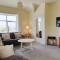 BRYN GORS-3 BED-FIRST FLOOR APT- YARDS FROM BEACH
