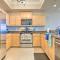 Sunny First-Floor Condo with Ocean-View Balcony!