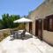 Elpida's Stone Houses