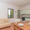 Apartment Stella con piscina comune - REI101 by Interhome