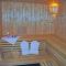 Villa Poseidon - WE 5 mit Strandkorb am Strand und strandnah