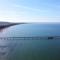 Villa Poseidon - WE 5 mit Strandkorb am Strand und strandnah