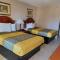 Carom Inn a Travelodge by Wyndham Denham Springs-Baton Rouge - Denham Springs