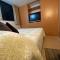 2 Rooms, 1 King Size bed, 64" Smart HDTV