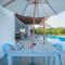 Whispering Palms by StayVista - Pool-view villa with Boutique interiors, Terrace & Lawn