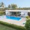 Whispering Palms by StayVista - Pool-view villa with Boutique interiors, Terrace & Lawn