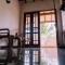 Thilak House