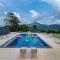 SaffronStays Sundowner by the Lake, Karjat - party-perfect pool villa with rain dance and cricket turf