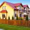 Half of holiday home, terrace, playground