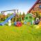 Half of holiday home, terrace, playground