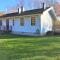 Idyllic bungalow close to sea and forest