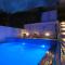 Apartments Mastelic with pool next to the beach