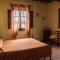 Room in Holiday house - Apartment in Farmhouse Casolare dei Fiori