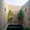 SaffronStays Turquoise Maison - 3BR pool villa with jacuzzi, bonfire & fruit garden near Lake Kalote, Karjat