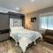 Modern-Chic Interlochen Home with Deck and Game Room!