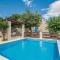 Four-Bedroom Holiday Home Zmijavci With A Fireplace 09