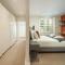 Sleek flat with communal courtyard