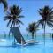 Apartamento a beira-mar com piscina