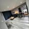 Modern 3BR Apartment - Sleeps 6 - Parking & Pets - Coast Serviced Apartments - Enquire for Trade & Long Stays