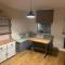 Upstairs river apartment