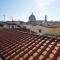 A refuge with a terrace overlooking the Duomo