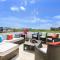 3-Level Condo with a Private Balcony & Rooftop Lounge