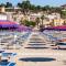 Terrace under Taormina just a few minutes walk to the free beach and downtown!