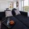 Penthouse mit Kamin, Dachterrasse, Meerblick, Gasgrill, Klimaanlage, Luxus-Design-Apartment, 2 Minuten zum Strand