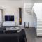 Penthouse mit Kamin, Dachterrasse, Meerblick, Gasgrill, Klimaanlage, Luxus-Design-Apartment, 2 Minuten zum Strand