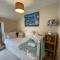 Extended Fishermans cottage with stunning sea views