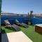 Ático Arinaga con vistas , jacuzzi , terraza y barbacoa