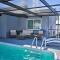 Port Richey Getaway with Lanai, Pool and Grill!