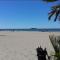 Hélios 24, T2 climatisé, parking, terrasse, 500m plage