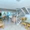 LaPlaya 201C Breathtaking Gulf panorama from this corner end unit with a private stairway to the beach