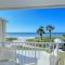 LaPlaya 201C Breathtaking Gulf panorama from this corner end unit with a private stairway to the beach