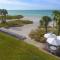 LaPlaya 201C Breathtaking Gulf panorama from this corner end unit with a private stairway to the beach