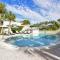 LaPlaya 201C Breathtaking Gulf panorama from this corner end unit with a private stairway to the beach