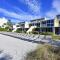 LaPlaya 201C Breathtaking Gulf panorama from this corner end unit with a private stairway to the beach