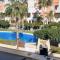 Homes of Spain, Apartamentos Paraíso Vera Playa, Ed Nuku Hiva, Bajo W con jardín y piscina privada a pie de playa, WIFI