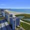 Beachfront Pool View Condo Steps Away From the White Sandy Beaches