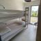 Joli appartement 4 personnes - vue mer - 普洛埃默