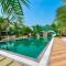 SaffronStays Palm Paradise - twin 3BR villas with pool, slides, mango plantations & outdoor games near Mumbai