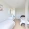 Apartment Maya - Parking and distant view by Interhome