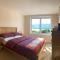 Borrodale, one bedroom apartment with balcony and loch view.