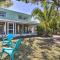 Tropical Waterfront Home Central Location!