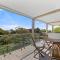 Family Retreat with water views at Corlette